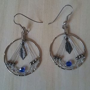 Cool silver leaf and bead dangly earrings